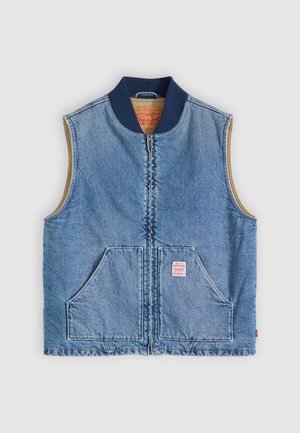Ærmeløs lys blå denimvest med lynlås foran, to skrånende lommer, marineblå krave og beige inderfor.