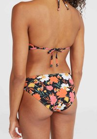 Ziedu bikini komplekts ar melnu pamatu un krāsainiem ziediem. Sasienamas kaklā un aizmugurē; gluda auduma un piegulošs apakšdaļa.