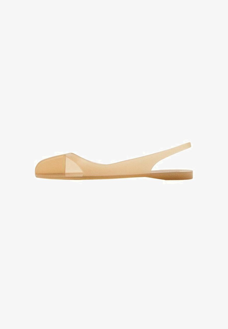 Translucent beige flat sandal with a pointed toe, open back, and minimalistic design. Made of flexible material and features a smooth texture.