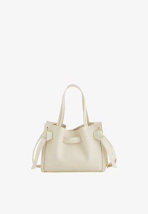 Sac à main en cuir couleur crème avec double poignées, sangles latérales et ferrures dorées, présenté sur fond blanc.