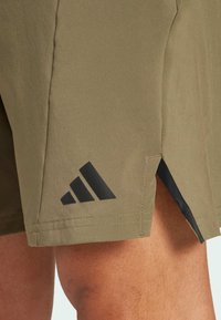 adidas Performance Sportske kratke hlače - olive strata