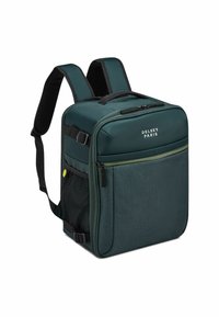 Zaino in tessuto verde con forma rettangolare, spallacci imbottiti, tasca frontale con zip e tasca laterale in rete. Logo Delsey Paris ben visibile.