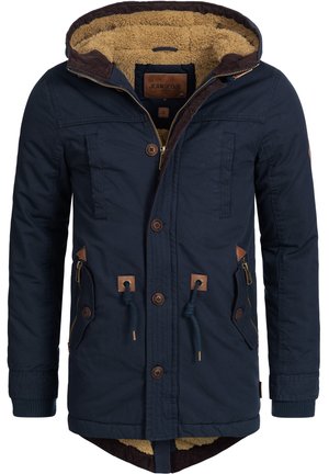 Marineblauwe parka-jas met een afneembare capuchon, een bruine fleecevoering, accenten van imitatieleer, voorzakken en verstelbare trekkoorden.