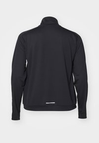 Black long-sleeve pullover jacket in a smooth, lightweight material with a high collar and a reflective bar at the hem.