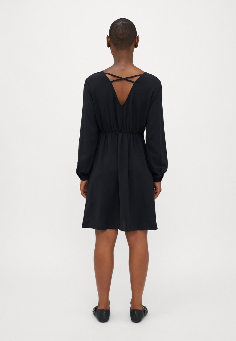 sachin and babi light blue dress 15 Ways to Style the Little Black Dress for Any Occasion main image 0