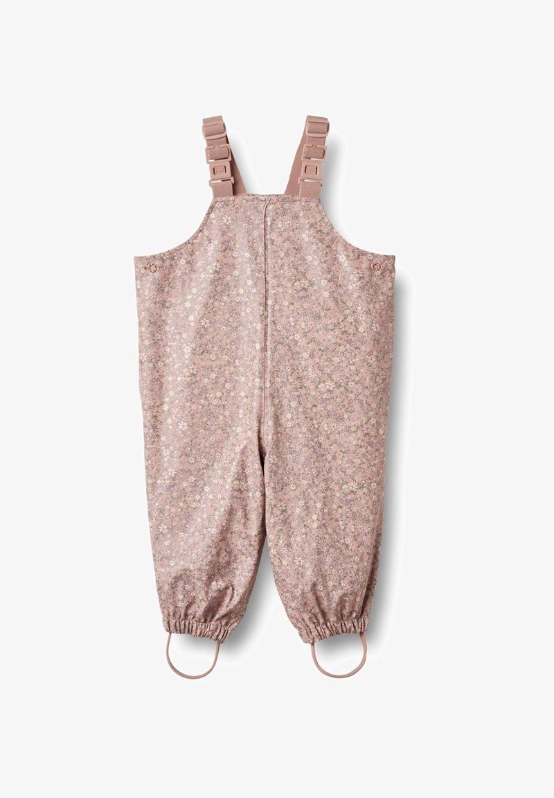 Rosarosa mönstrade hängselbyxor med blommönster, justerbara axelremmar, elastiska muddars och sidoknappar. Tillverkade av lätt material.