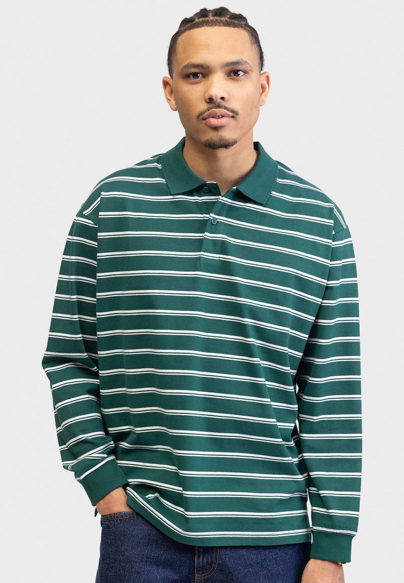 Green long-sleeve polo shirt with white horizontal stripes, featuring a collar and button placket, made from a soft, lightweight fabric.