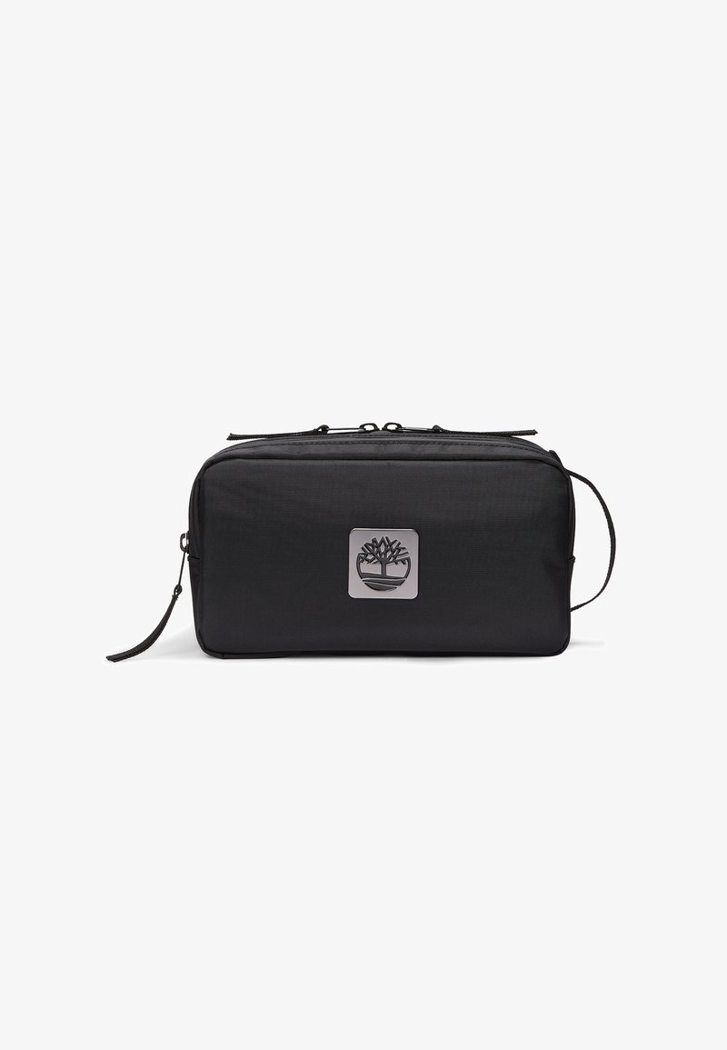 Borsa nera, rettangolare, realizzata in tessuto resistente, dotata di una placca con logo argentato e chiusura con zip. Include una tracolla e una superficie testurizzata.