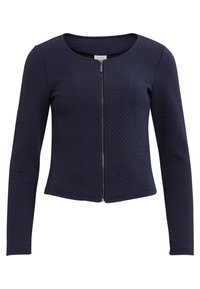 Chaqueta de cremallera azul marino con un tejido texturizado, cuello redondo y mangas largas. Presenta un diseño entallado y un sutil patrón geométrico.