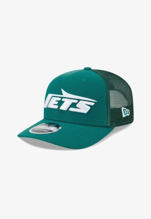 Grüne Baseballkappe mit weißem "JETS"-Logo vorne und Netzrückseite, ausgestattet mit gebogenem Schirm und verstellbarem Druckknopfverschluss.