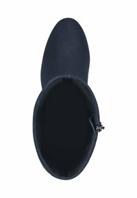 Bottines bleu marine en tissu texturé, avec un bout arrondi et une fermeture zippée sur l'intérieur. L'intérieur présente un revêtement sombre.