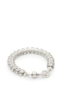 Bracciale in argento con collegamenti geometrici alternati e cristalli trasparenti. Texture liscia con un design del fermo sicuro.