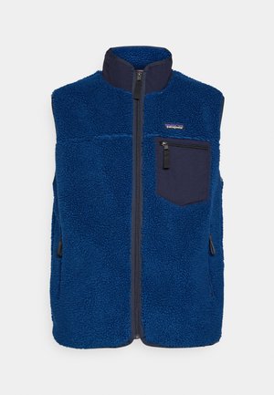 Blue sherpa fleece vest with navy zip-up collar, front zipper, and zippered chest pocket with Patagonia logo.