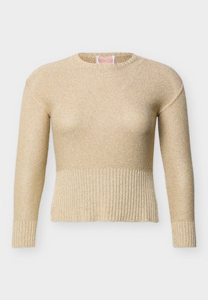 Beige long-sleeve knitted sweater with ribbed cuffs and hem, featuring a round neckline and a slightly textured fabric.