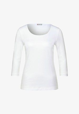 T-shirt blanc à manches longues avec un col rond. Fabriqué en tissu lisse avec une silhouette ajustée et sans motifs ni éléments visibles.