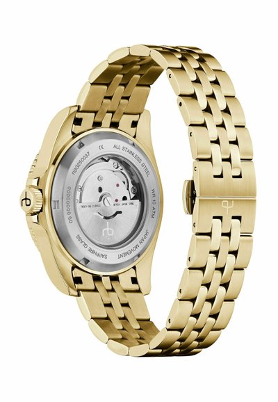 Montre-bracelet en acier inoxydable doré avec mouvement automatique visible à travers un fond transparent et bracelet en métal articulé.