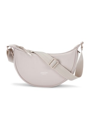 Világos bézs keresztpántos táska ívelt, félhold alakú formával. Sima anyagból készült, anyag pánttal és finom márkajellel. Cipzáras záródás.
