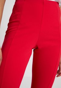 Missguided Leggings - Byxor - red