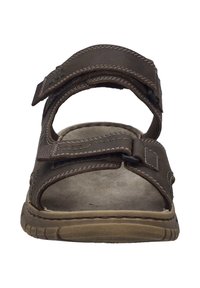 Brązowe skórzane sandały z dwiema regulowanymi paskami, otwartym czubkiem, przeszyciami i teksturowaną podeszwą dla lepszej przyczepności.