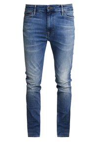 Modré denimové džíny s úzkým střihem, s jemným vyblednutím, designem pěti kapes, poutky na opasek a knoflíkovým zapínáním. Vyrobené z bavlny s jemnou texturou.