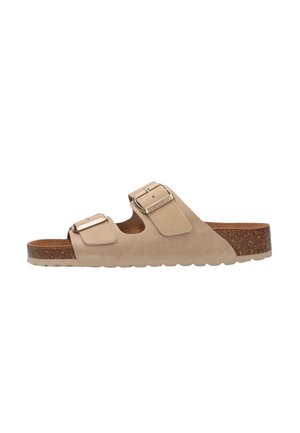 Beige slip-on sandal med to justerbare spænderemse og en korkfodseng med gummisål.
