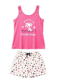 Débardeur rose avec l'inscription "South Beach Florida State" et Snoopy sous un palmier, associé à un short blanc orné de motifs de palmiers et de coquillages.