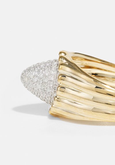Gold ring featuring a conical, diamond-encrusted top with a textured band composed of polished, curved lines.