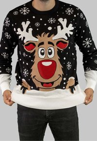 Zwarte feestelijke trui met een cartoon rendier ontwerp, witte sneeuwvlokken, rode accenten en een geribbelde witte zoom en manchetten.