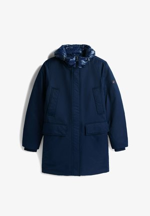 Donkerblauwe geïsoleerde jas met een puffy capuchon, twee voorzakken en een rits aan de voorkant. Heeft een soepele textuur en een minimalistisch design.