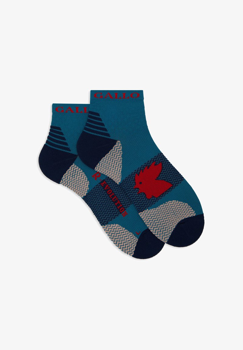 Calzini alla caviglia blu e blu navy con un motivo geometrico, logo rosso "GALLO" e un grafica di un uccello rosso, realizzati in un materiale morbido e stretch.