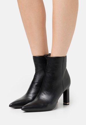 Calvin Klein, Bottines à talons hauts - black