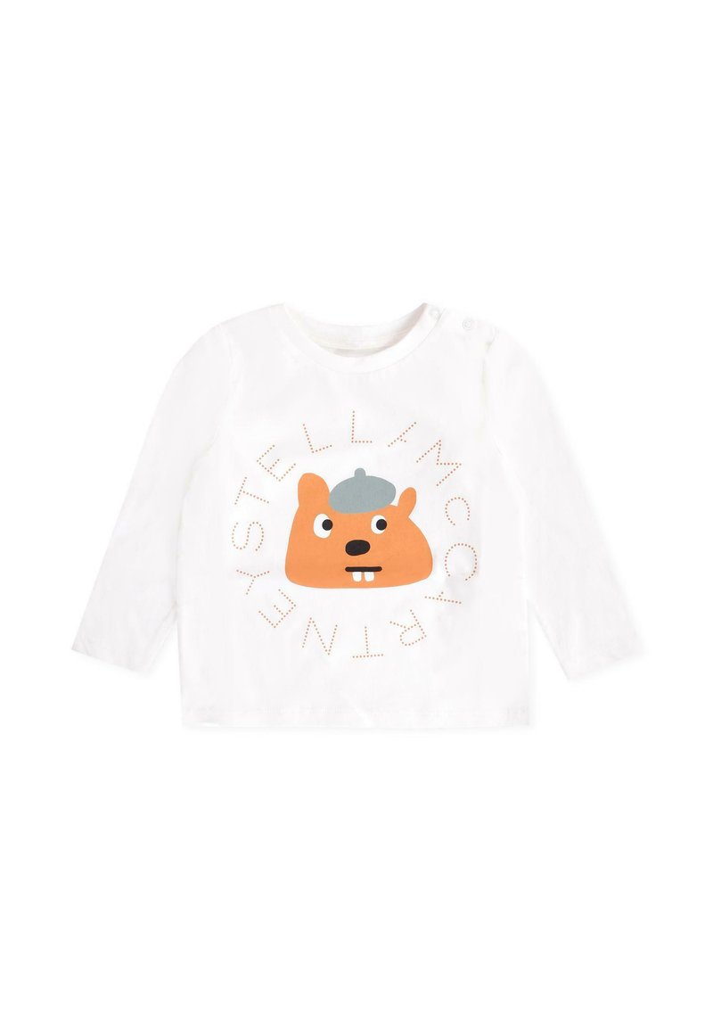 Camicia bianca a maniche lunghe con un castoro animato arancione che indossa un cappello grigio e la scritta "STELLAMCCARTNEY" in modelli a pois attorno ad esso.