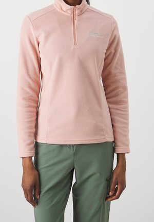 Ljusrosa fleecetröja med ståkrage och halvdragkedja. Har långa ärmar och en liten logotyp på bröstet.