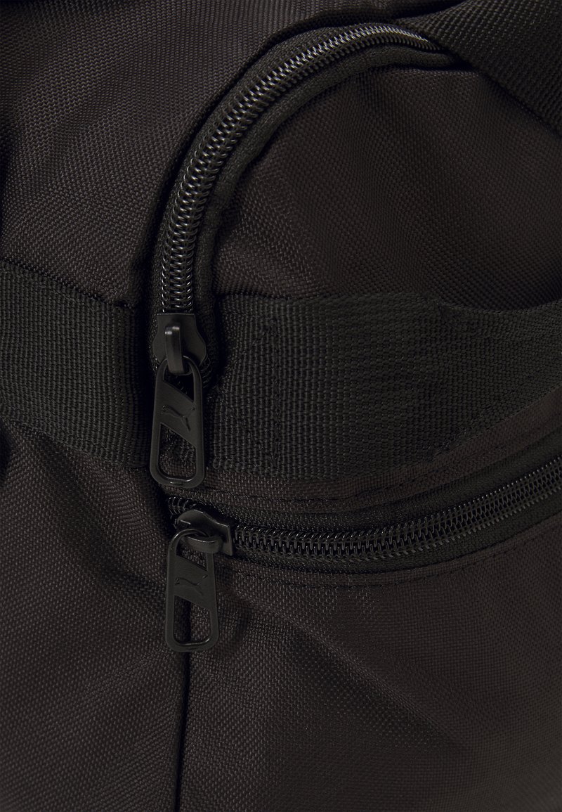 puma challenger backpack size