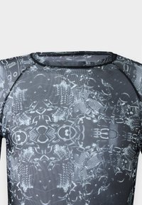 Black and gray patterned athletic shirt with a round neckline, featuring intricate designs and a fitted, smooth texture.