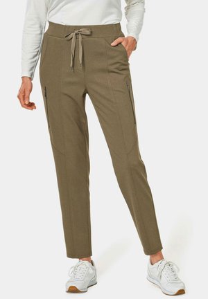 Olivgrüne, schmal geschnittene Hose mit Kordelzugbund, seitlichen Taschen und kontrastierenden Nähten. Strukturierter Stoff mit glatter Oberfläche.