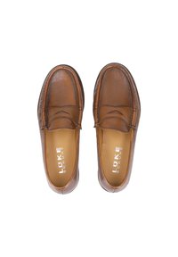 Brown leather loafers featuring a smooth texture, stitched detailing, and a rounded toe design with branding on the insole.