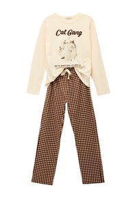 Langærmet cremefarvet top med "Cat Gang" grafik og brune ternede pyjamasbukser med snøre i taljen. Blødt bomuldsblandingsstof.