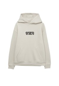 Sudadera con capucha en una mezcla de algodón beige claro, con un bolsillo tipo canguro y un diseño gráfico en negro en el pecho. Textura suave, ajuste oversize.