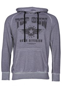 Grå hoodie med framficka, utrustad med en svart dragsko, tryckt grafik med "TOP GUN" och stjärnornas emblem på bröstet.