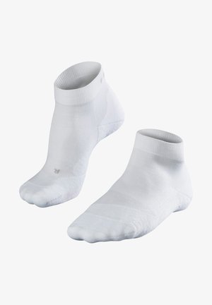 Calzini bianchi alla caviglia realizzati in tessuto liscio, con bordi a coste, punta senza cuciture e design minimalista. Adatti per uso casual o sportivo.