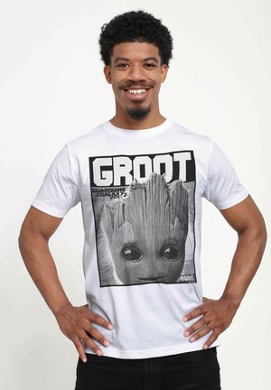 White short-sleeve T-shirt featuring a black and white graphic of Groot from Marvel's Guardians of the Galaxy on the front.