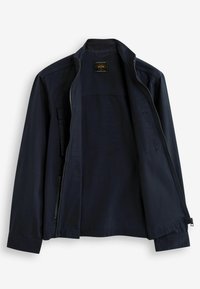 Navy blue zip-up jacket with stand collar, long sleeves, and two front pockets, shown open on a white background.
