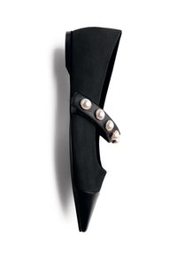 Black pointed-toe flat shoe with a strap across the top adorned with four large pearl-like buttons.