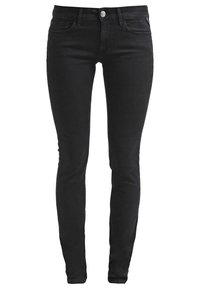 Jeans ajustados negros de denim con una textura suave, que cuentan con cinco bolsillos y un cierre frontal con un solo botón. Corte entallado en general.