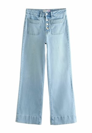 Light blue wide-leg jeans with front button closure and dual square patch pockets on white background.