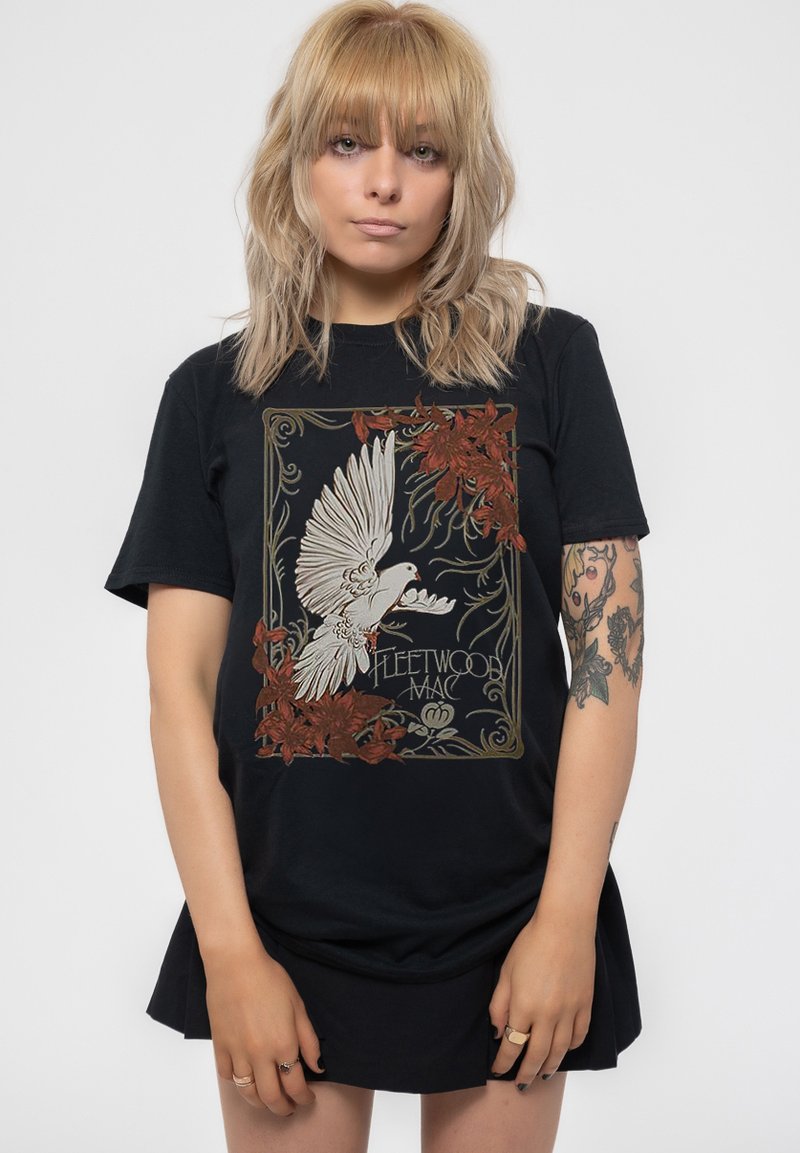 Black cotton t-shirt featuring a graphic design of a white bird and red foliage, with "Fleetwood Mac" text below in a decorative frame.