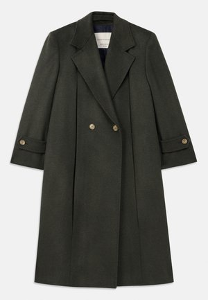 Dark green wool blend coat with a double-breasted design, broad lapels, and gold-tone buttons. Features three-quarter length sleeves.