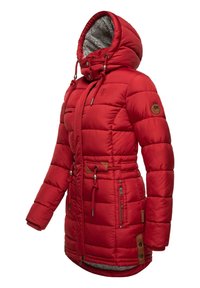 Red puffer jacket with a hood, quilted design, two front pockets, drawstring waist, and faux fur lining inside the hood. Leather accents present.