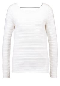 White long-sleeve top featuring a textured stripe pattern, with a slight boat neckline and a fitted silhouette.